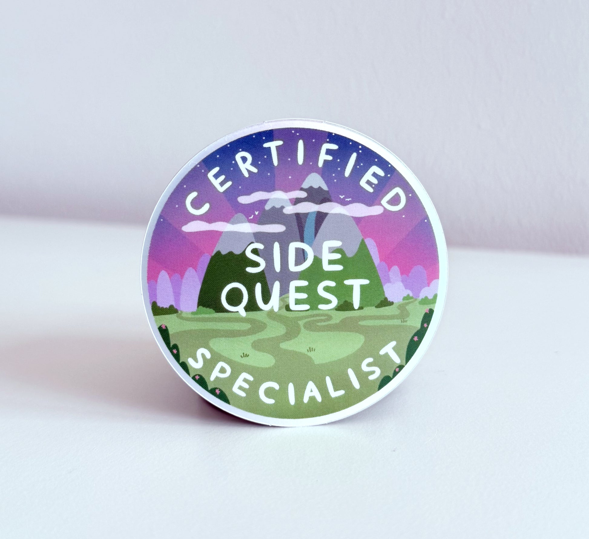 Matte and mirrored vinyl sticker - certified side quest specialist. ADHD, neurodivergence, self-love, self-acceptance, gifts for neurodivergence, gaming, distracted, healing journey.
